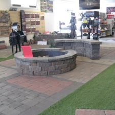 Large brick outdoor fireplaces in showroom